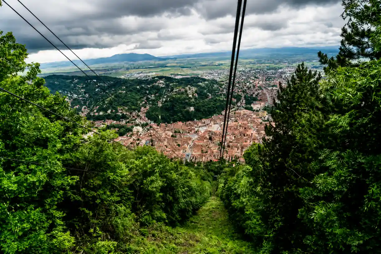 View over Brașov and the surrounding hills from the Tâmpa cable car line